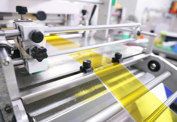 Fully automated tape die-cutting equipment featuring servo-driven systems, vision alignment, and programmable control for complex, high-precision jobs.
